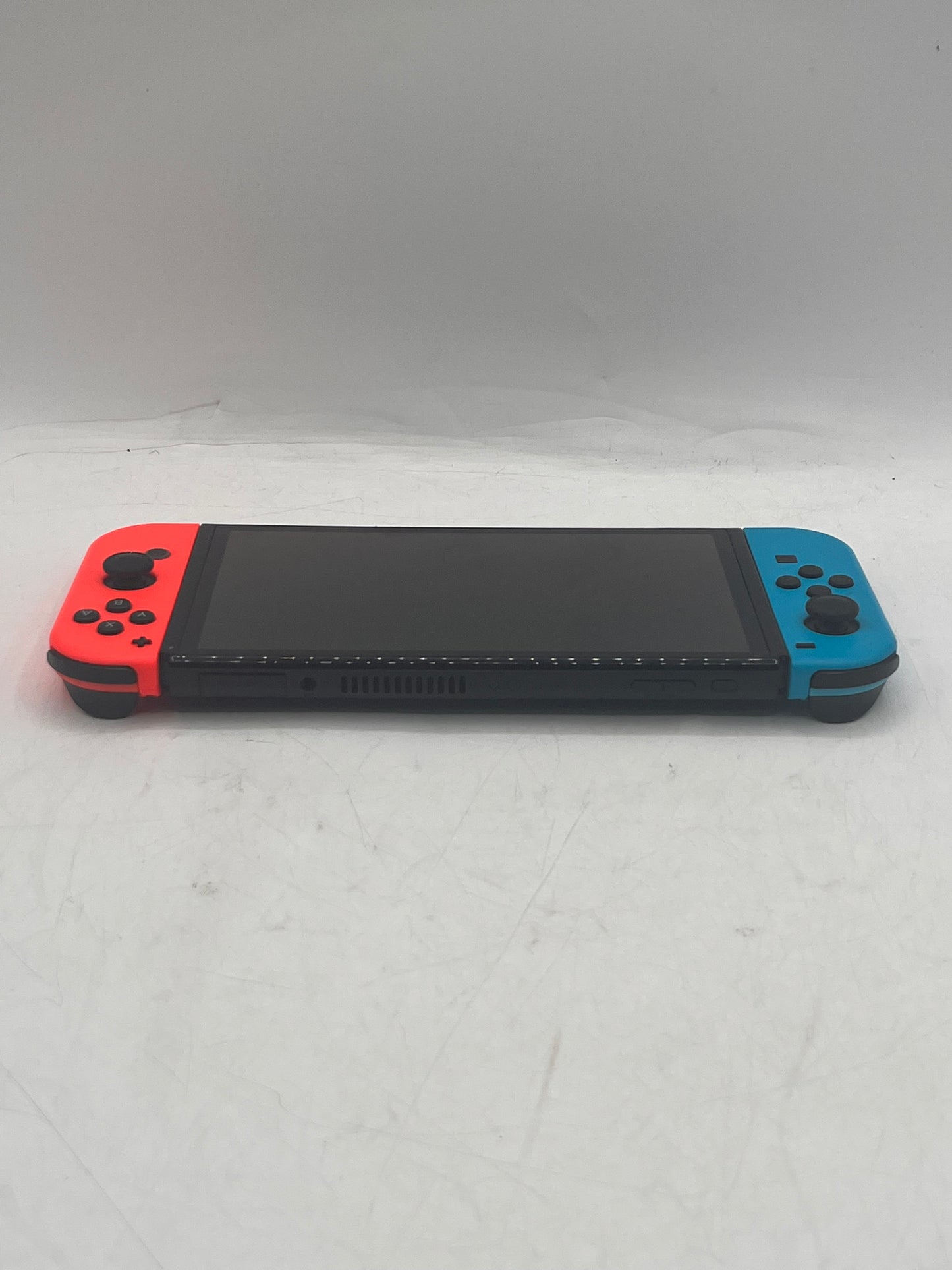 Nintendo Switch OLED (HEG-001) 2021 Video Game System 64GB w/ blue and red Joy-Con