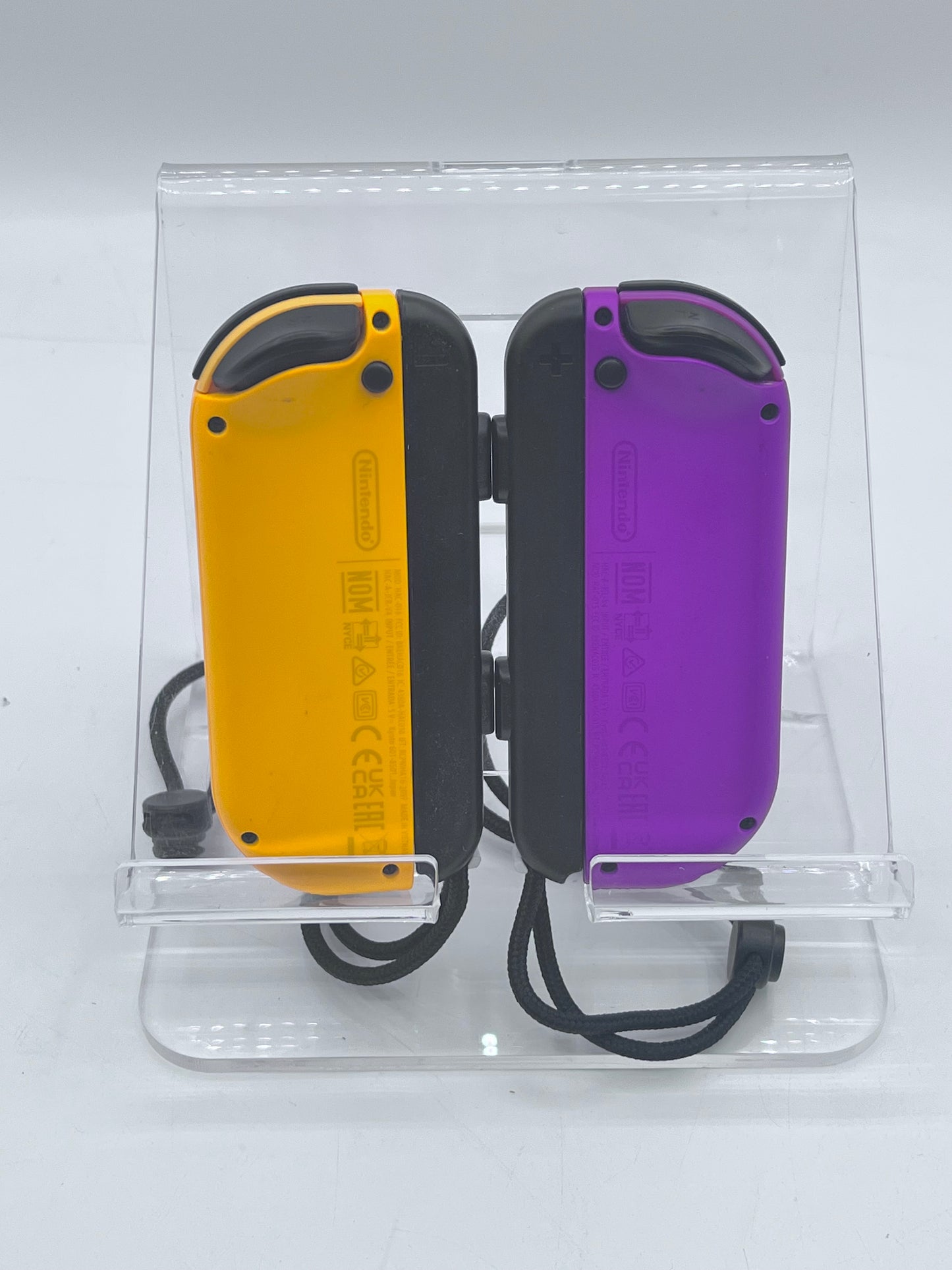 Nintendo Joycons Orange and Purple