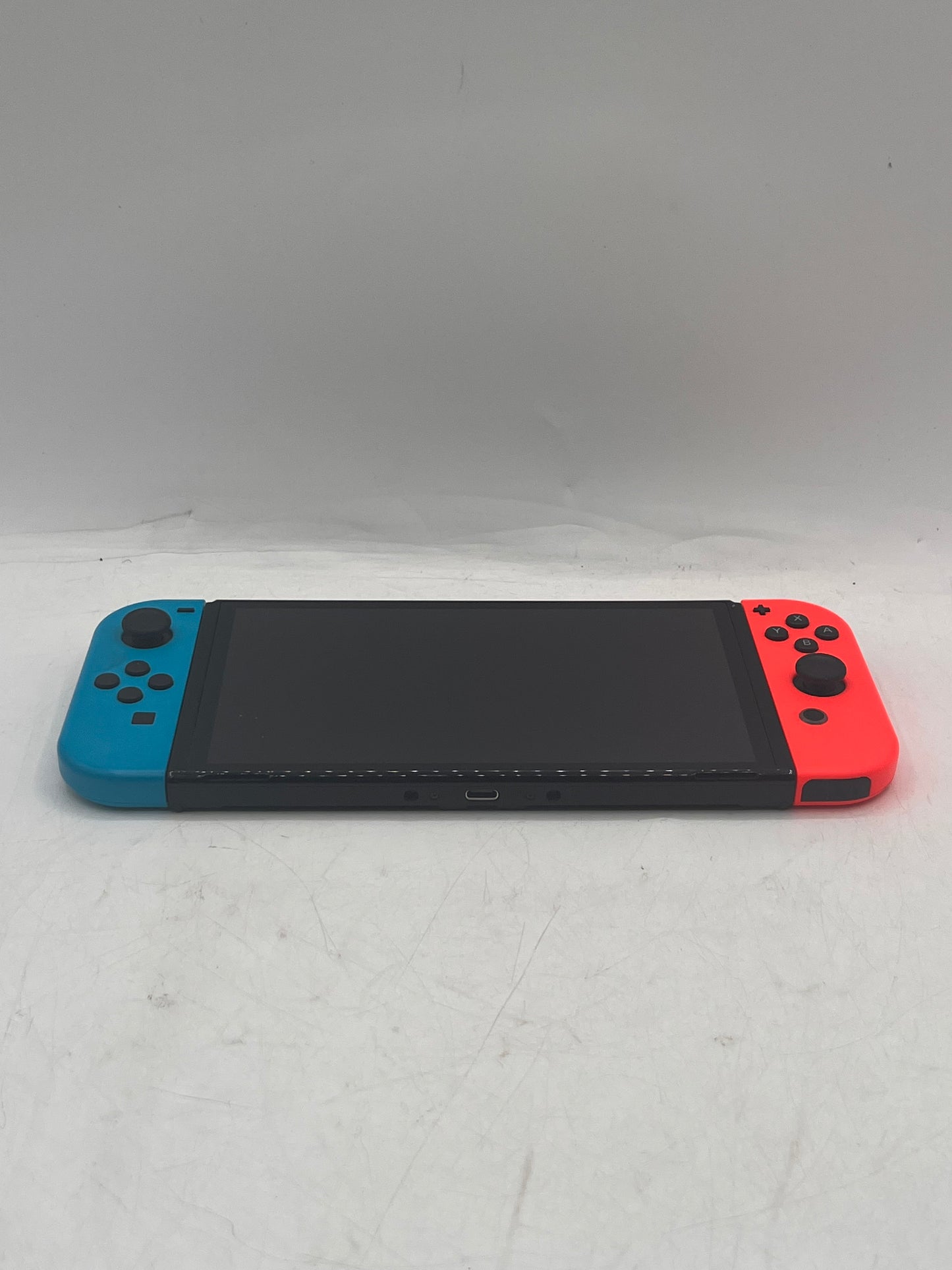 Nintendo Switch OLED (HEG-001) 2021 Video Game System 64GB w/ blue and red Joy-Con