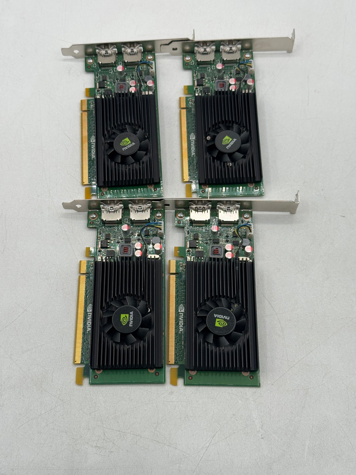Lot of 4 NVIDIA NVS 310 1GB DDR3 PCI Express x16 Video Cards, 2x DisplayPort