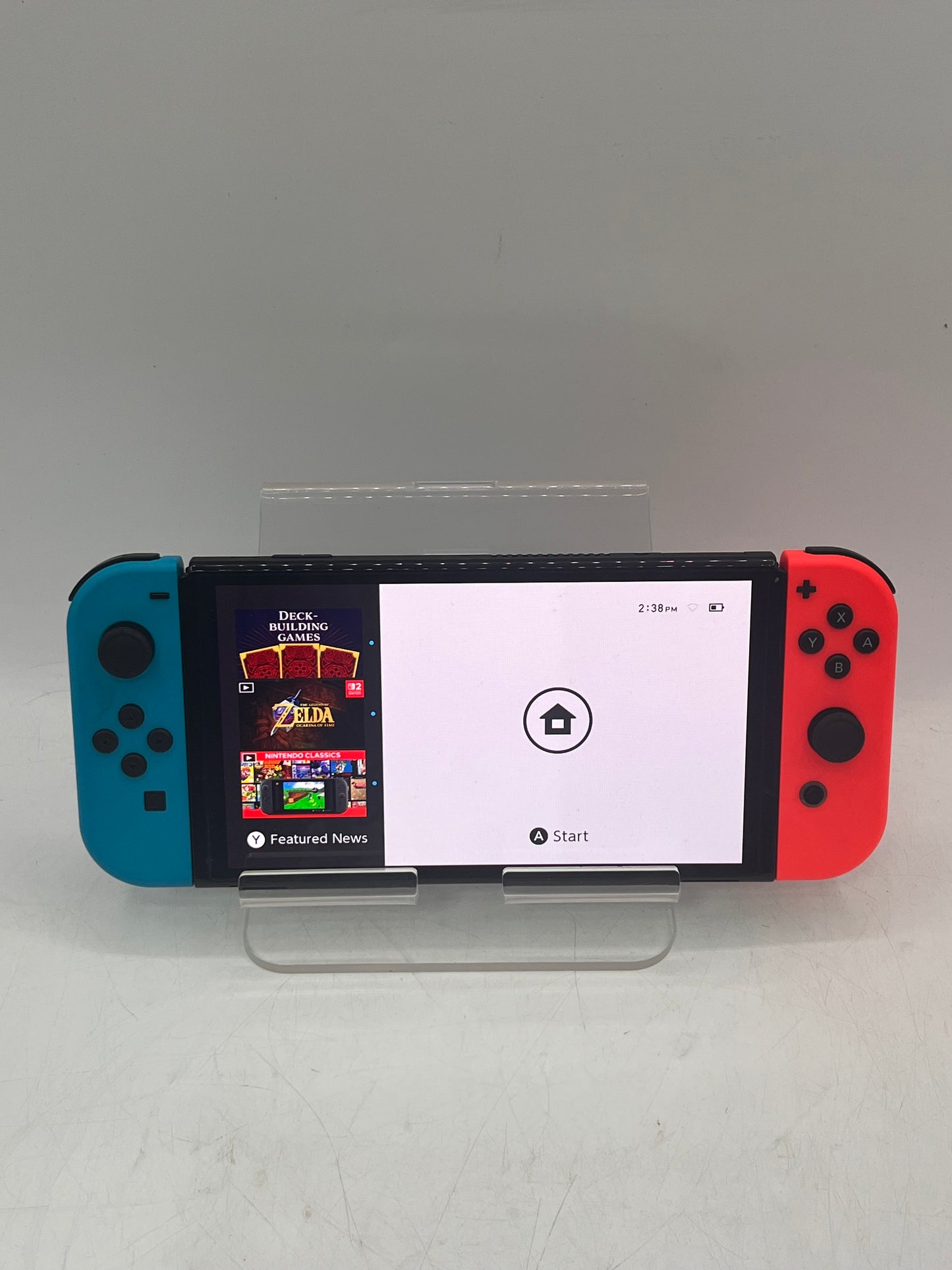 Nintendo Switch OLED (HEG-001) 2021 Video Game System 64GB w/ blue and red Joy-Con