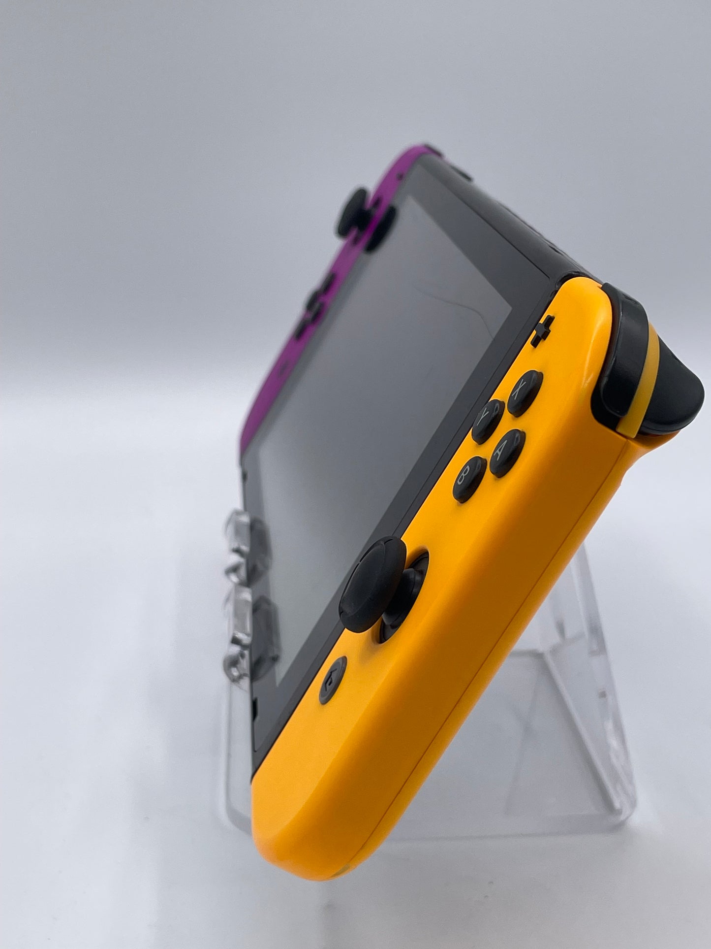 Nintendo Switch HAC-001 Handheld Video Game Console + Purple & Orange Joy-Cons