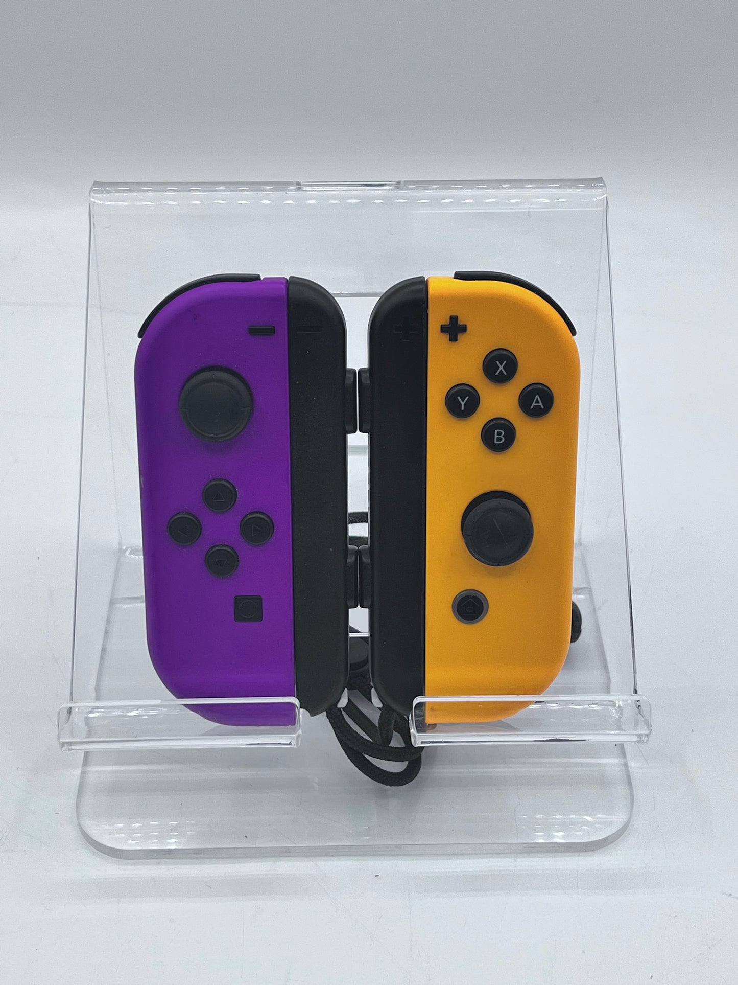 Nintendo Joycons Orange and Purple
