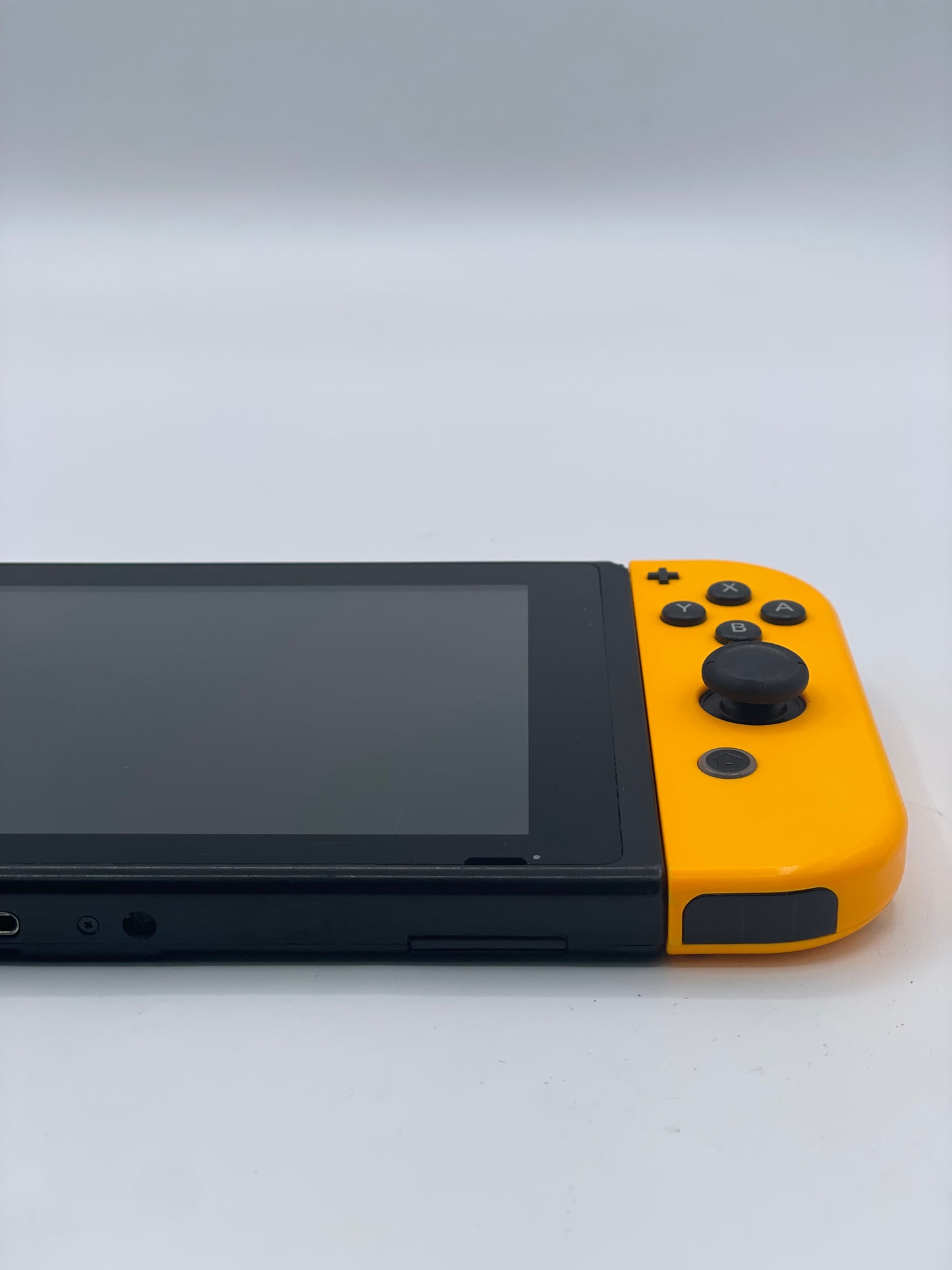Nintendo Switch HAC-001 Handheld Video Game Console + Purple & Orange Joy-Cons