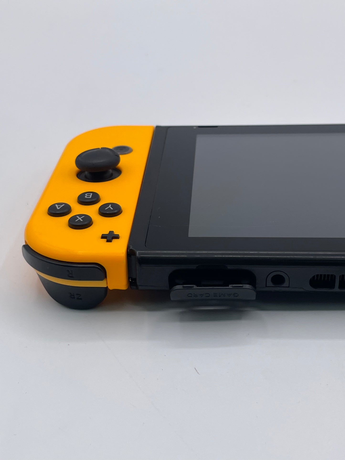 Nintendo Switch HAC-001 Handheld Video Game Console + Purple & Orange Joy-Cons