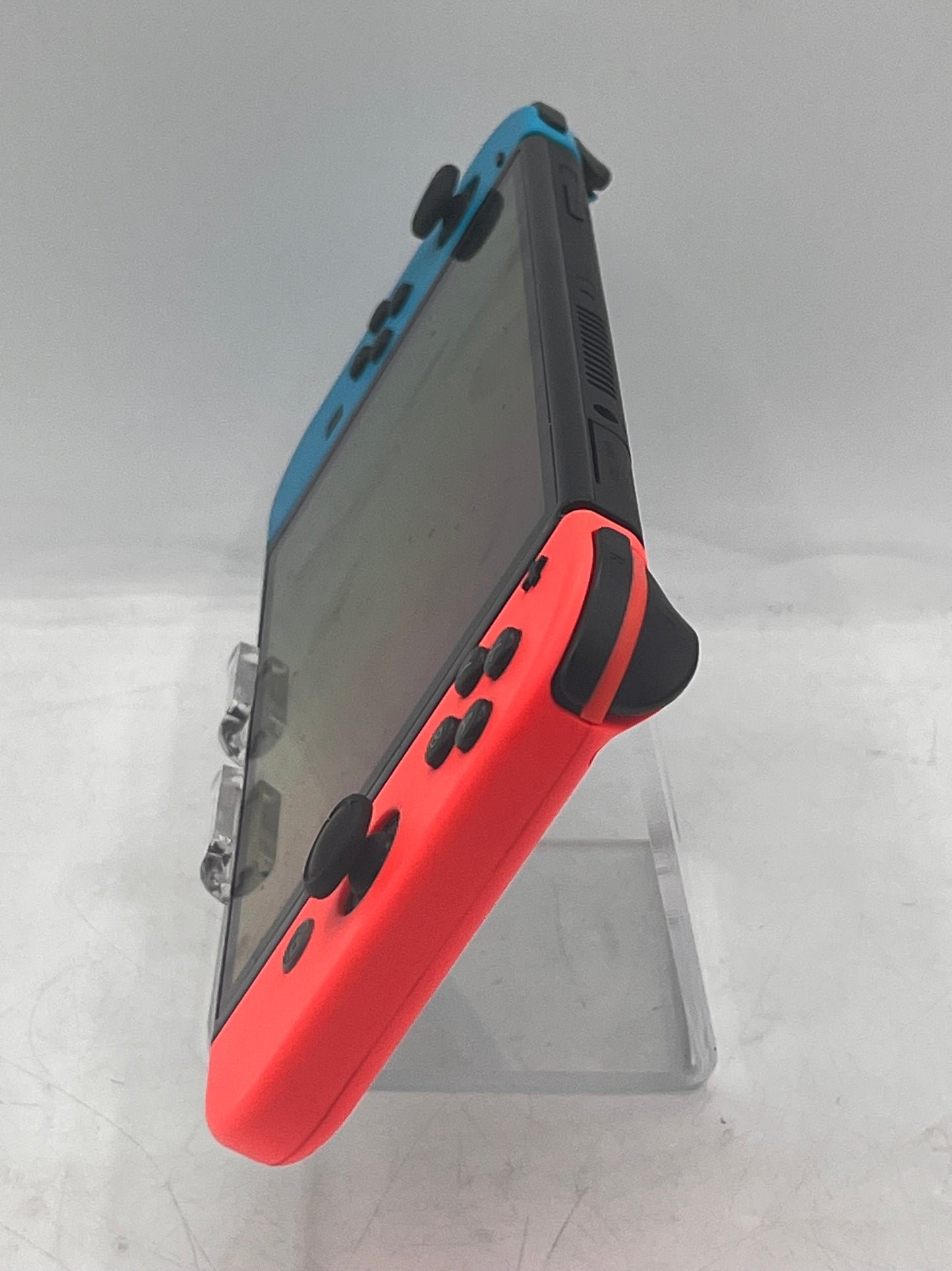 Nintendo Switch OLED (HEG-001) 2021 Video Game System 64GB w/ blue and red Joy-Con
