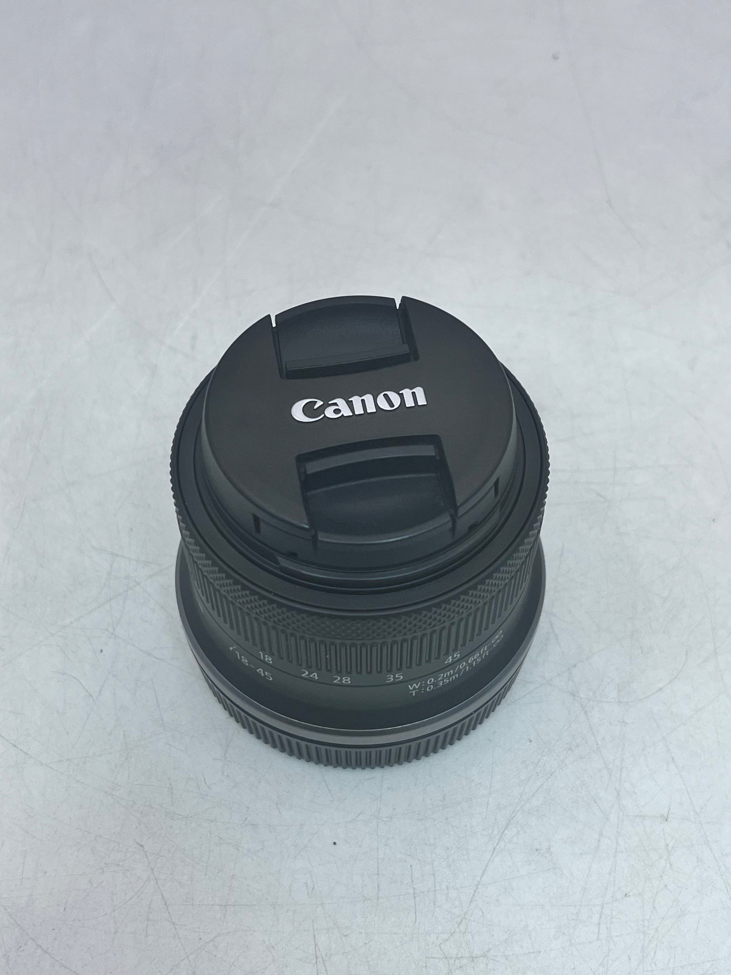 Canon EOS R100 Mirrorless Digital Camera with 18-45mm Lens with Charger and Battery Tested