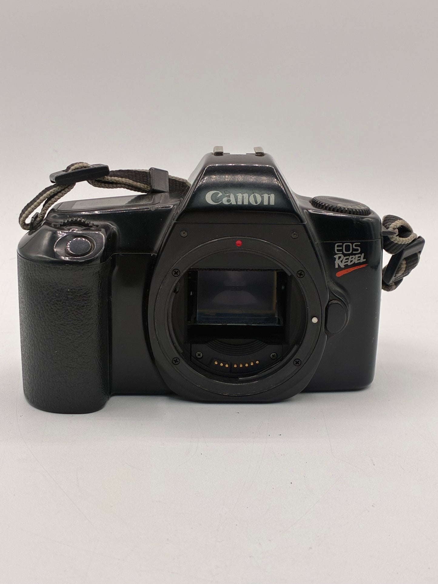 Vintage Canon E0S Rebel camera with 35-70mm lens untested good condition
