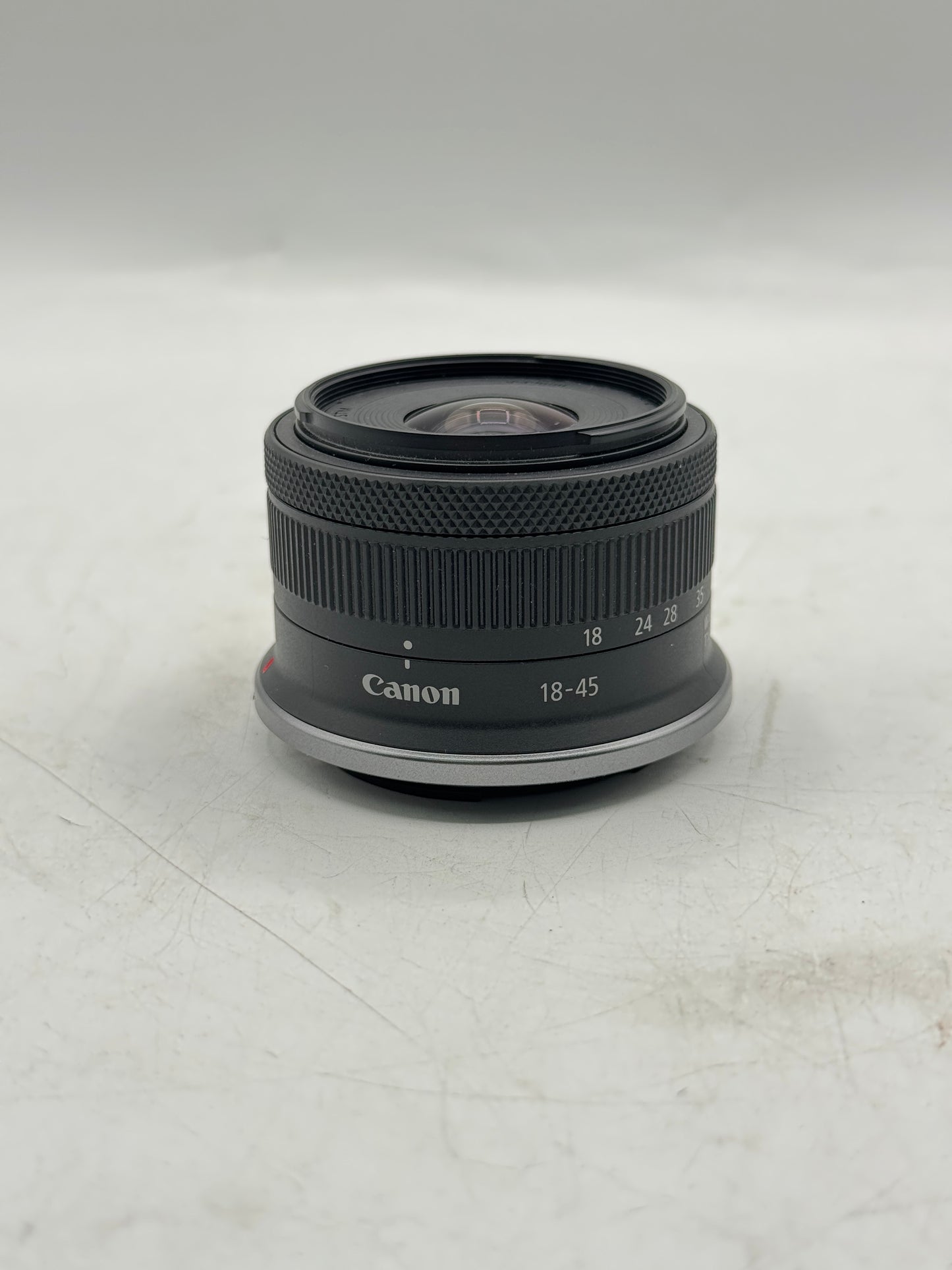 Canon EOS R100 Mirrorless 24.1 MP Camera with RF-S 18-45mm f/4.5-6.3 and Battery