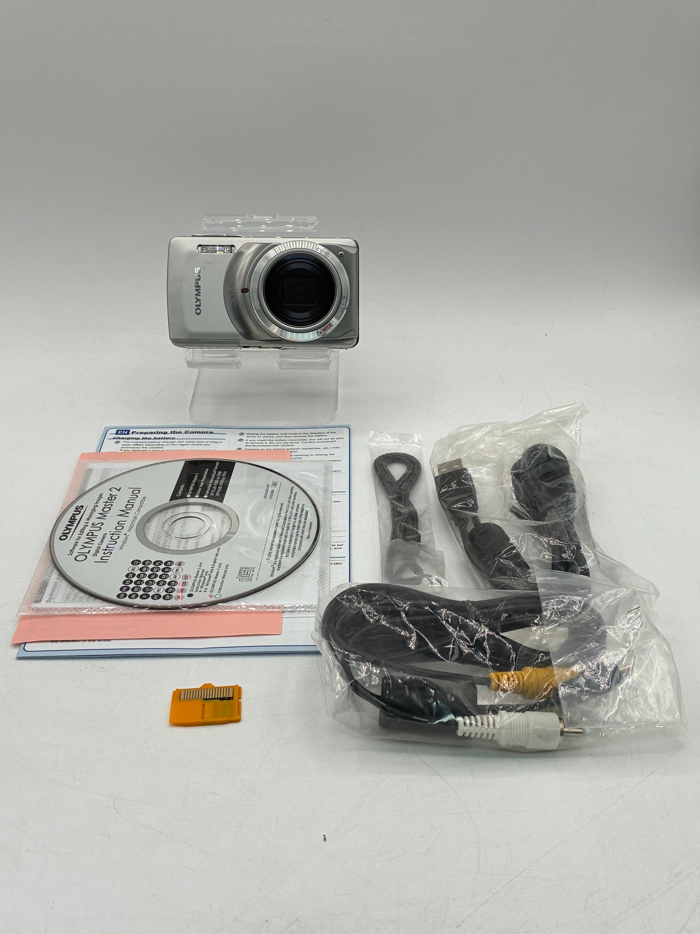 Olympus Stylus 7010 12.0MP Digital Camera Silver with Box